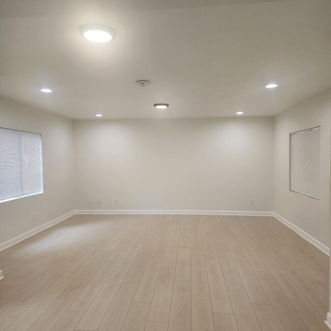 Spacious Living Room; New Blinds; New Flooring; New Paint - 10901 Laurel Canyon Blvd