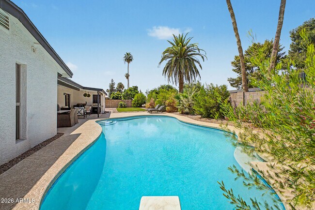 Building Photo - 5140 E Poinsettia Dr