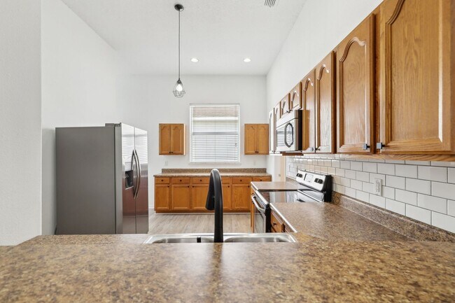 Building Photo - SPECIAL: WAIVING $250 ADMIN FEE on this 3 Bedroom, 2 Bath with Private Balcony off Primary Bedroo...