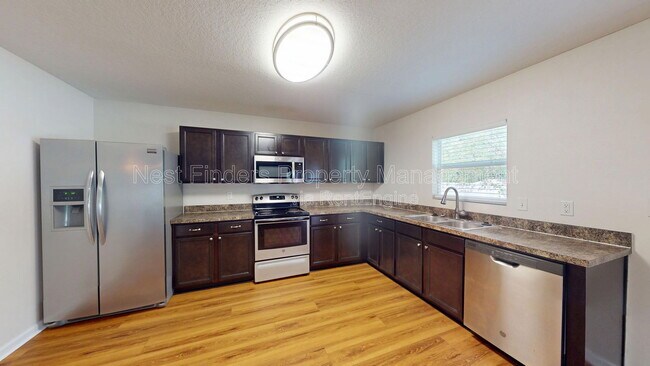 Building Photo - 5000 Magnolia Valley Dr