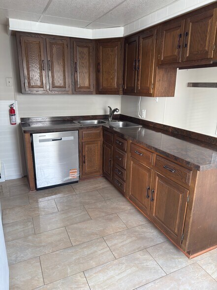 Kitchen with new dishwasher - 707 Ford Blvd