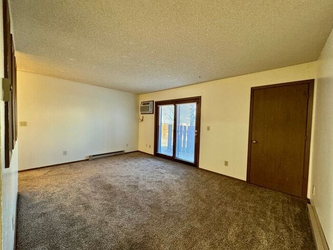 Building Photo - RENT INCLUDES ALL UTILITIES, except for el...