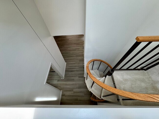 Building Photo - Spacious 2-Story Falconbridge Condo with Private Courtyard and Resort-Style Amenities