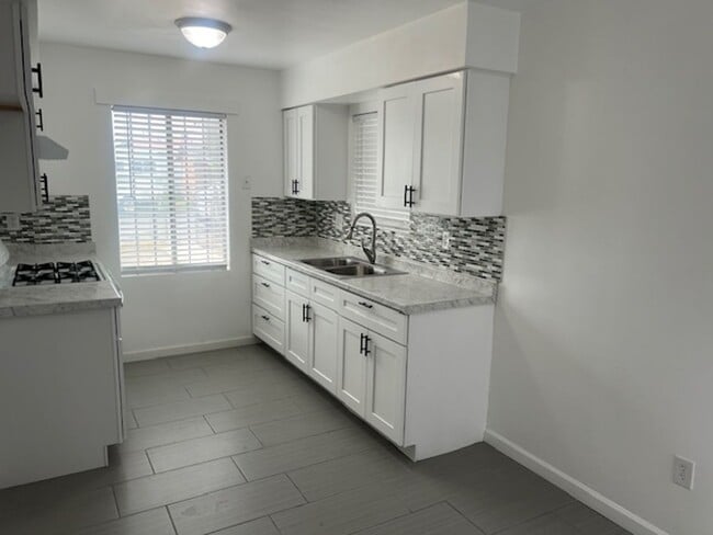 Building Photo - Available Now