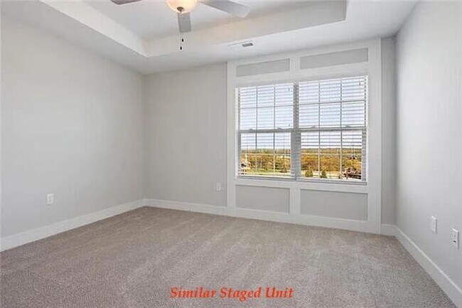 Building Photo - Stunning and Bright 3BR 2.5BA Townhome w/ 2-Car Garage • Quartzite Kitchen • Deck in Parkville