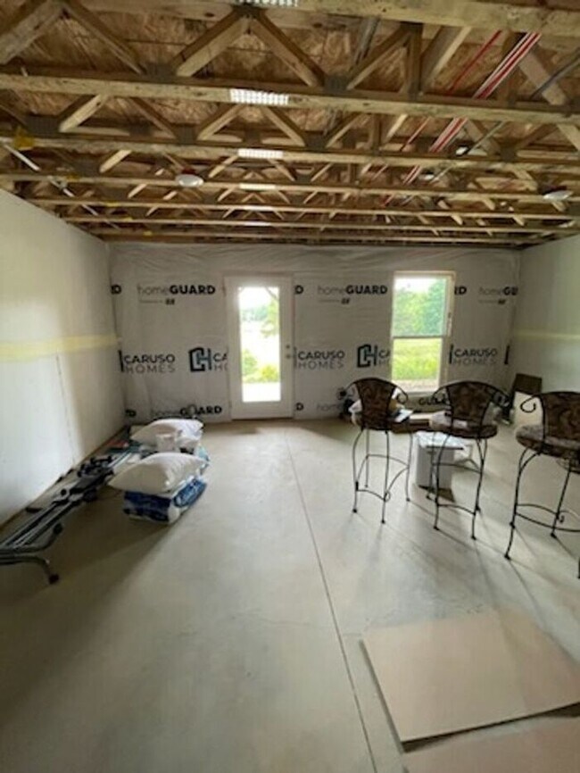 Building Photo - Scenic 3-Bed Townhome with Screened Porch, First Floor Storage & 1-Car Garage – Overlooking the G...