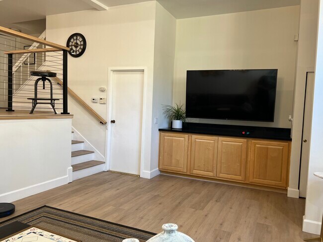 TV Room and Door to the Garage - 6242 Nita Ave