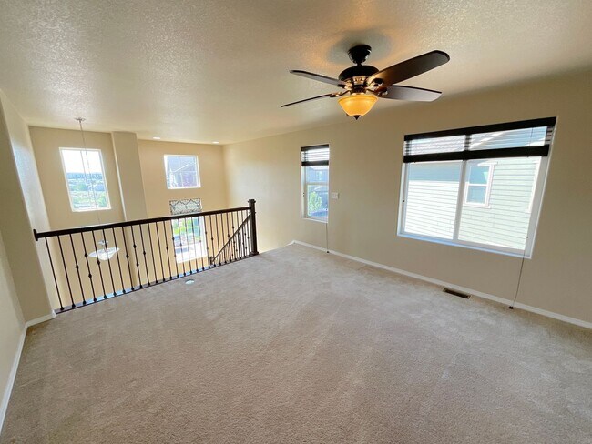 Building Photo - 4 Bedroom Home Available Near Voyager Pkwy...