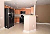 Building Photo - Fantastic 1 Bedroom Condo With Attached Ga...