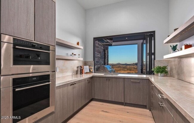 Building Photo - 4880 E Lone Mountain Rd N