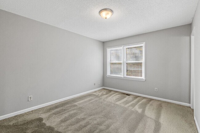 Building Photo - NE Home - Updated Kitchen and Bathrooms!  SS Appliances, Fire Place, Front Porch & Deck, Fenced Y...