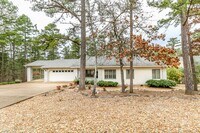 Building Photo - Beautiful 4 Bedroom, 3 Bath home. It has a 2 car garage plus a 1 car carport.  Stay warm in the w...