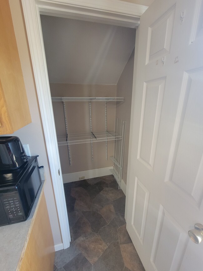 closet area with shelves - 34 7th St