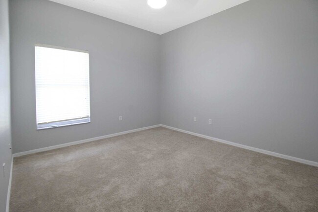 Building Photo - Annual rental: Spacious 3BR/2BA Creekwood Home with Office, Screened Lanai, EV Charger & Resort-S...