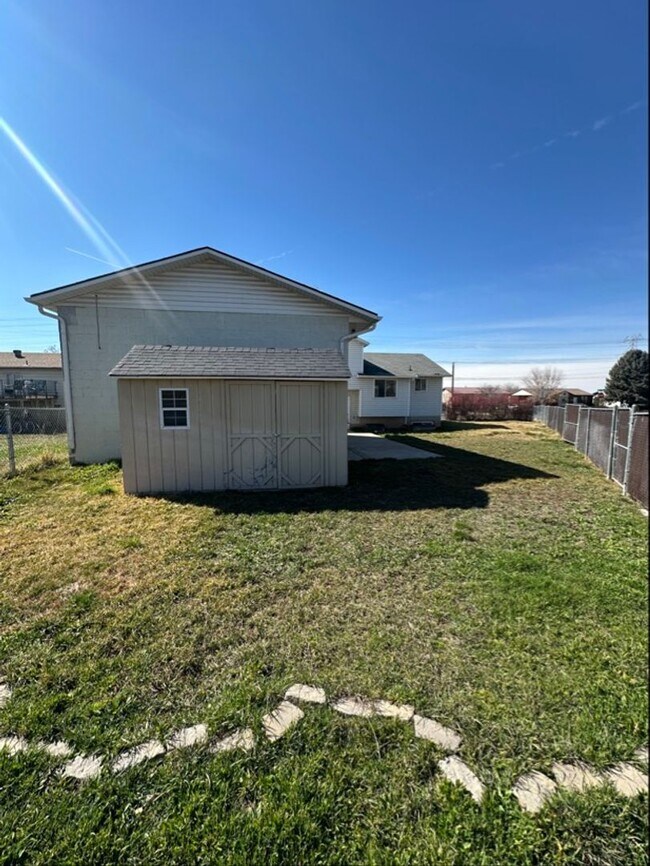 Building Photo - $1,800 Rent Credit! Spacious 5-Bed Clearfield Home with Garage & Fenced Yard