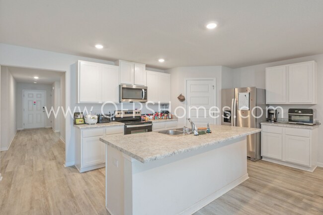 Building Photo - 4/2 in Pace Community!! AVAILABLE SEPTEMBER 2026!