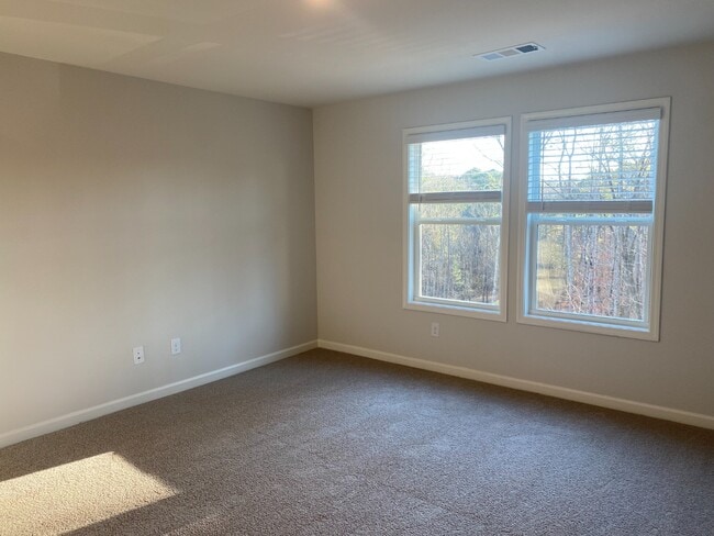 Building Photo - Modern 3-Story Townhome Near Woodstock High & Middle School