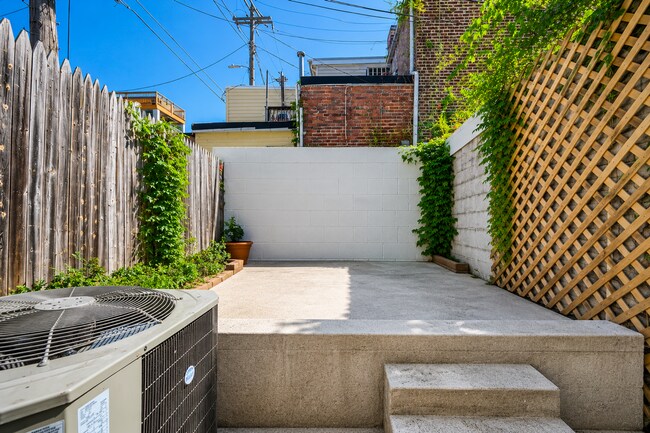 Building Photo - Charming Baltimore Rowhome with Exposed Brick & Private Patio