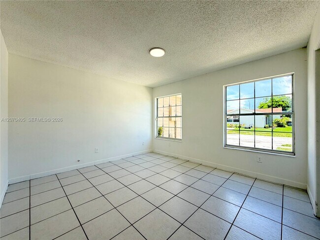 Building Photo - 9850 W Heather Ln