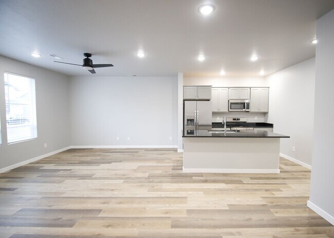 Building Photo - Baraya Townhomes: Modern Townhomes for Ren...