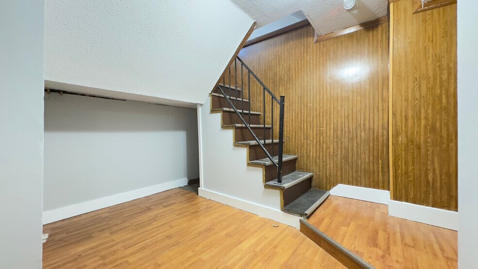 stairs down to lowe level - 150 Pleasant St