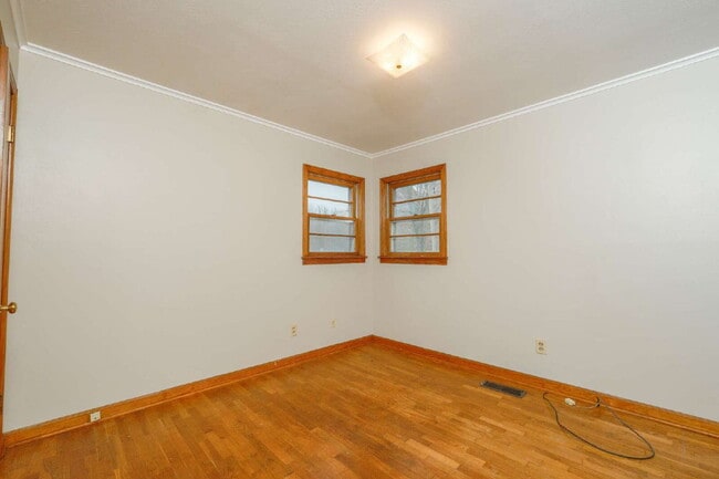 Building Photo - "Charming 3-Bedroom Greenfield Home with Gleaming Hardwood Floors – 1256 Sq Ft of Cozy Comfort!"