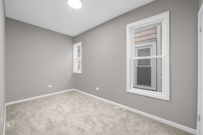 Building Photo - 7218 S Peoria St