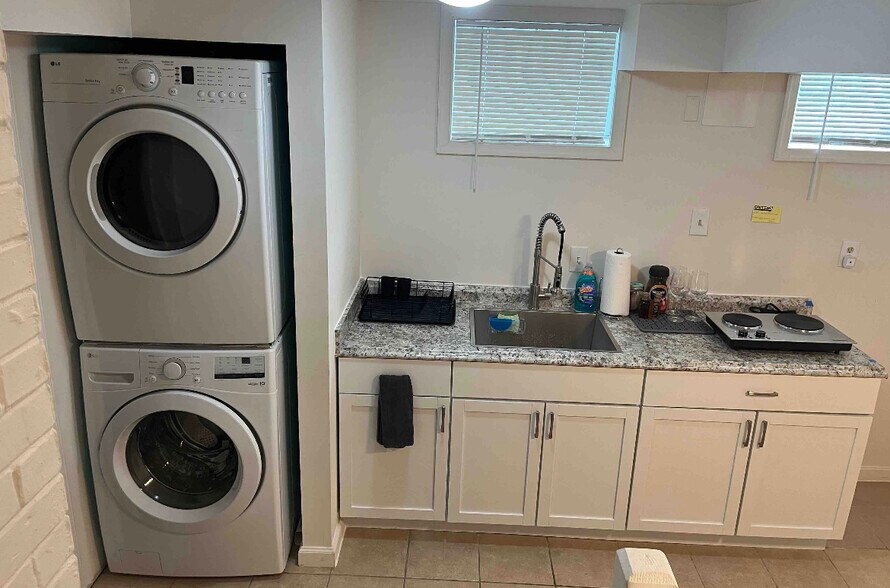 Kitchen and laundry - 9314 Cedar Ln