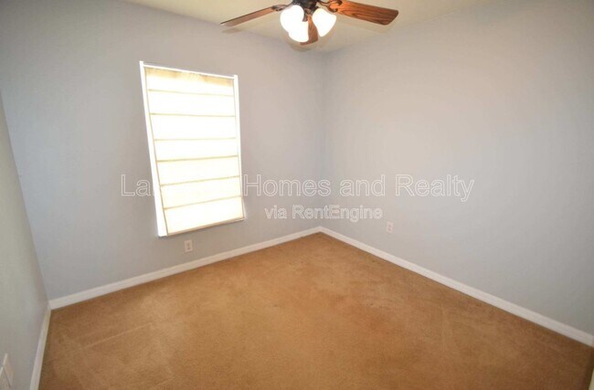 Building Photo - 5456 River Rock Rd