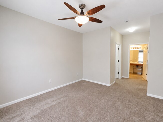 Building Photo - Spacious 2-Bedroom Condo with Garage, Fireplace, Pool & Most Included Utilities