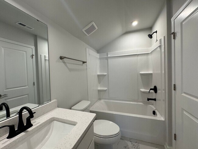 Building Photo - Spacious 1.5-Story 4BR Home with Bonus Room in Active 55+ Community