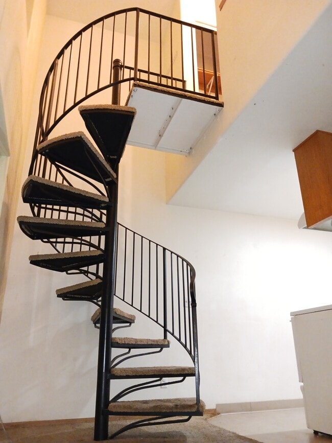 spiral stairs to the 3rd floor loft - 6205 SE 92nd Ave