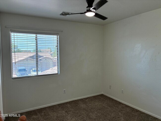 Building Photo - 7287 S Sunrise Way
