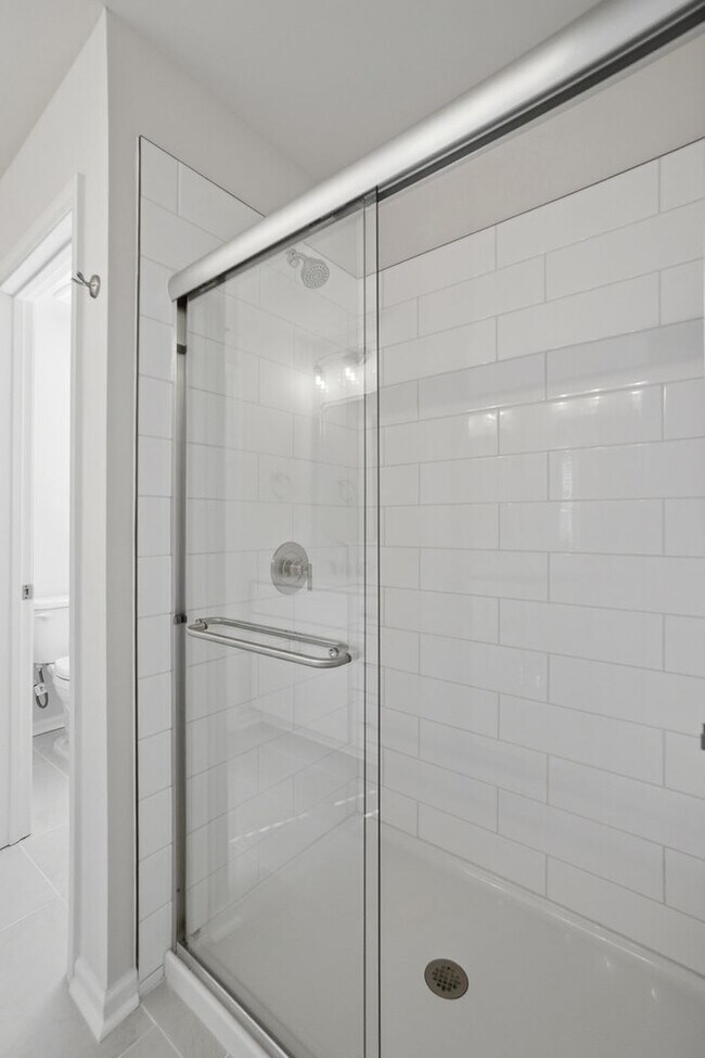 Building Photo - 4BR Home in The Pines at Paw Creek – New Construction + Private Deck