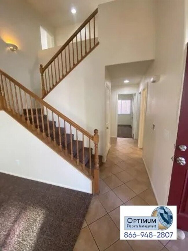 Building Photo - Spacious 4-Bedroom Home with 3-Car Garage & Downstairs Suite!