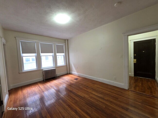 Building Photo - Central Brighton Location. Steps from the T Stop. Heat Hot Water Included. Elevator, Laundry on a...