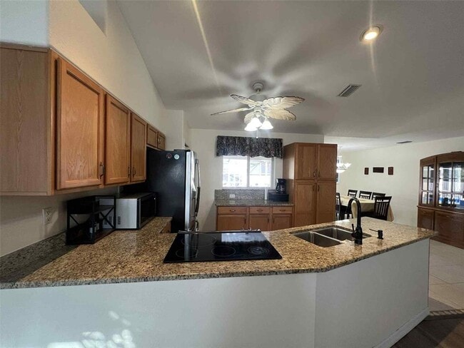 Building Photo - 6557 Freeport Dr