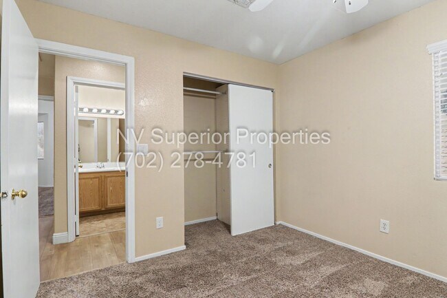 Building Photo - NW!! 4 bedrooms!! Bed & Bath DownStairs!!! RV Parking!!! Synthetic Grass Front yard!! Real Grass ...