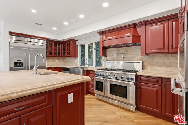 Building Photo - 1200 N Doheny Dr