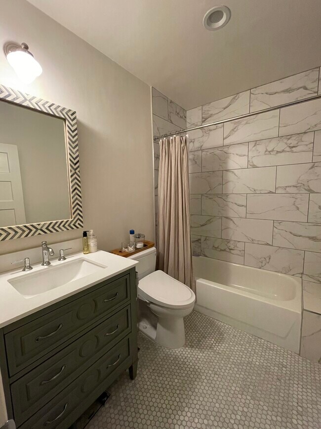 The bathroom upstairs-finished with carrera marble - 1501 Westerly Ter