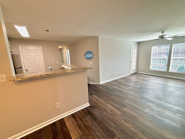 Building Photo - Modern 3-Bed Condo: Lovely Appliances, LVP...