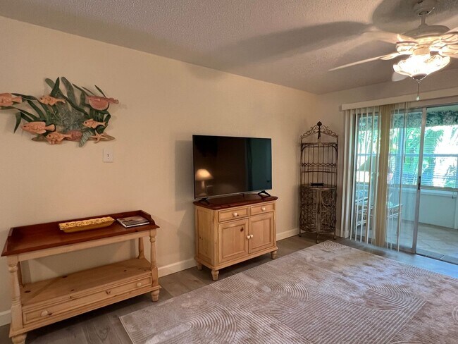 Building Photo - *55+ Community* 2nd floor furnished Condo