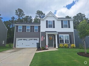 Building Photo - MOVE IN SPECIAL! Outstanding Four Bedroom ...