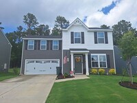 Building Photo - Outstanding Four Bedroom Home Less Than 10...