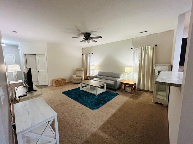 Building Photo - House with Fenced Backyard