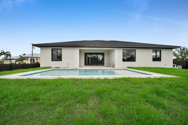 Building Photo - Brand-New Pool Home for Rent – Port Charlo...