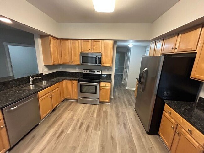 Building Photo - **Spacious 4-Bedroom Home with Walk-In Clo...