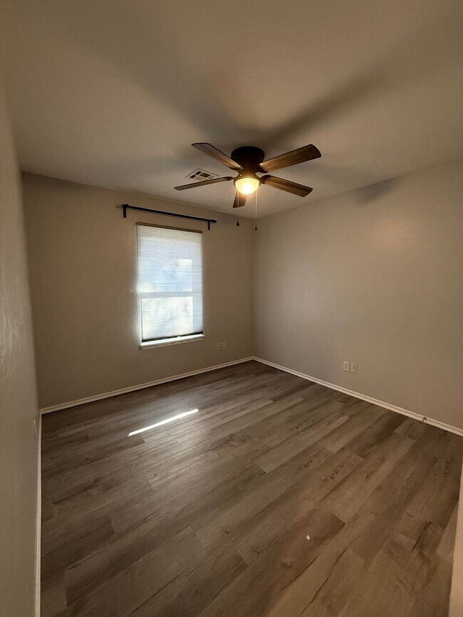 Building Photo - 4 Bedroom - 2 bath duplex located near campus and State Highway 9