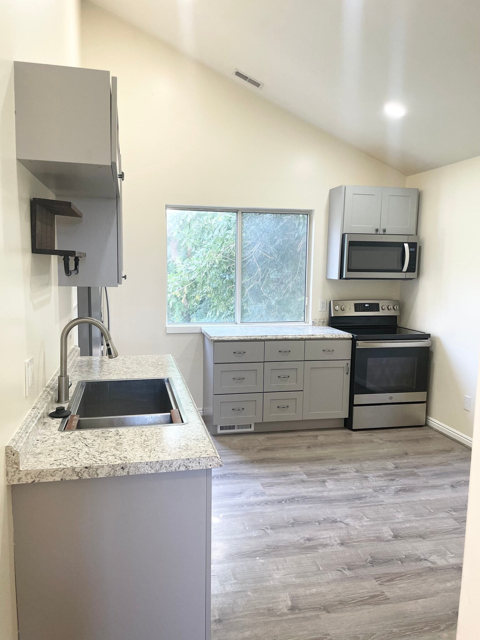 Full Kitchen with view of stream and backyard - 562 Pheasant Way
