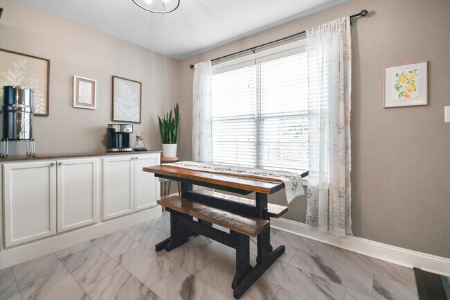 Building Photo - Pet Friendly Three Bedroom with Bonus!